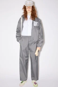 Sweatpants Mit Face-Aufnaher