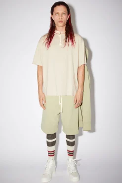 T-Shirt Mit Face-Aufnaher