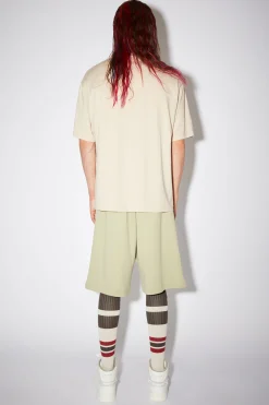 T-Shirt Mit Face-Aufnaher